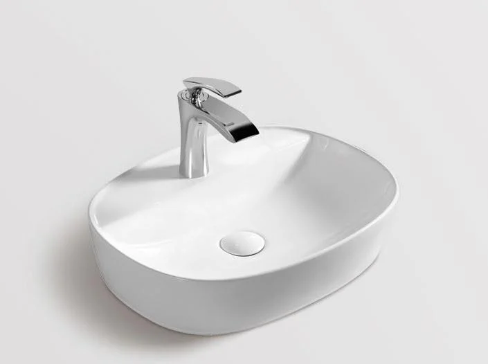 Lavoar oval MADISON, din porțelan, montaj pe blat 50x39cm - alb
